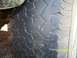 35x12.50x15 BFG All Terrains 40-50% tread.  2 showing alingment wear.  On aluminum bullet holes, 5 o...