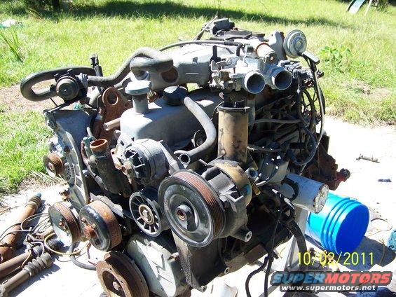 Ford V8 engine with pulleys and hoses. Date stamp 10/02/2011