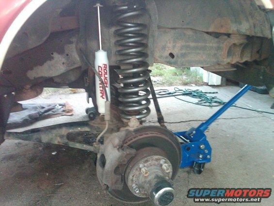 Rough Country shock and coil spring suspension part