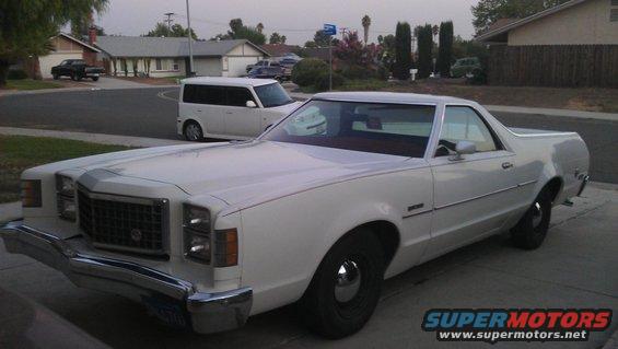 1978 Ford Ranchero parked in driveway, white exterior, chrome bumper