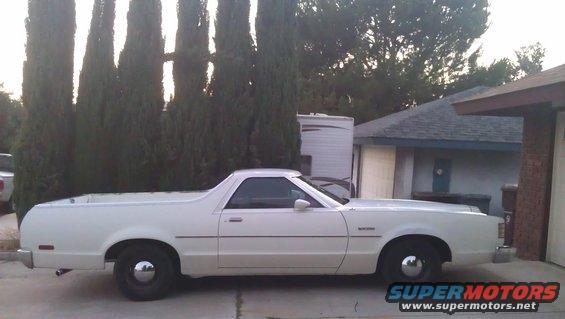 White 1978 Ford Ranchero parked in a driveway, side view