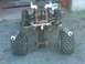 1995 Yamaha BANSHEE - Rear view of a 1995 Yamaha Banshee ATV with dual exhaust pipes.