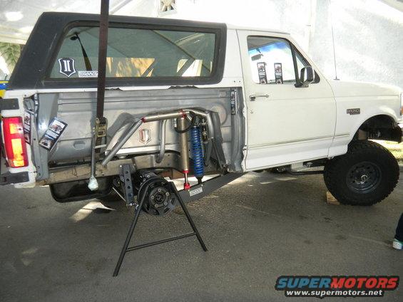 White Ford Bronco side view, custom suspension, off-road modifications