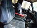 1985 Ford Bronco - Interior view of a truck's cabin, showing the seats and dashboard.