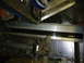 1985 Ford Bronco - Unidentified metal trim piece with black accent, likely an interior car part.