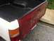 1989 Toyota Pickup/SR5 - Rear view of a 1989 Toyota Pickup/SR5 showing the tailgate and bed.