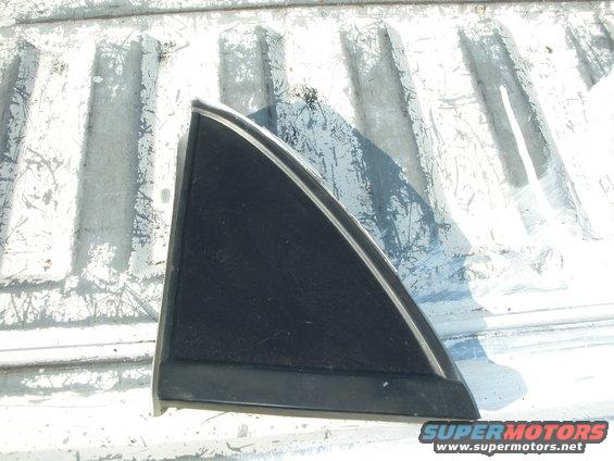 Black triangular window trim with chrome accent