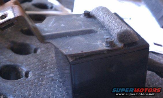 Black wiper repair part with metal bracket and foam padding