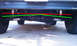 1993 Ford Bronco - Close-up view of a vehicle's front steering rack and suspension system, marked with measurement lines.
