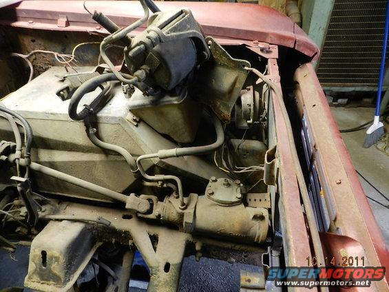 Engine bay view of steering box and brake booster assembly