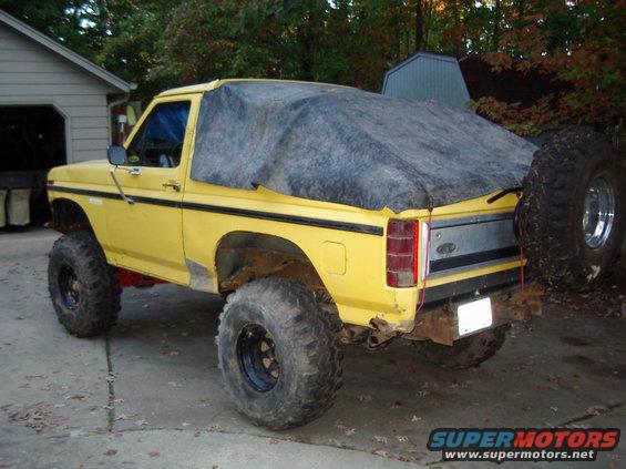 imgp0858.jpg Good picture of my rubber top.  Made from roofing rubber my buddy found at the dump.  I intend to put snaps down the sides later.