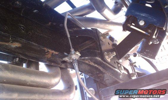 Underbody view of brake line and exhaust pipes
