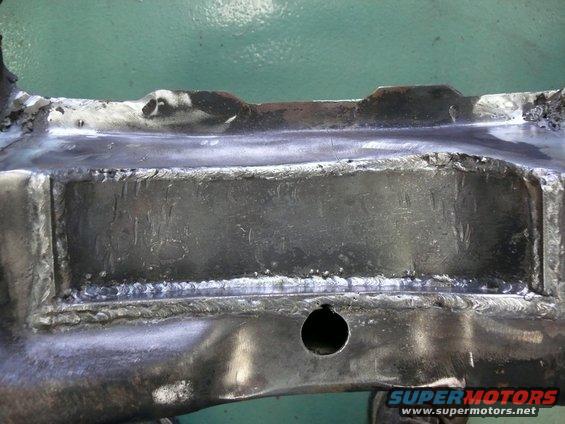 Welded frame section with visible text
