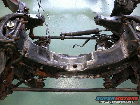 Front suspension subframe assembly with steering components attached