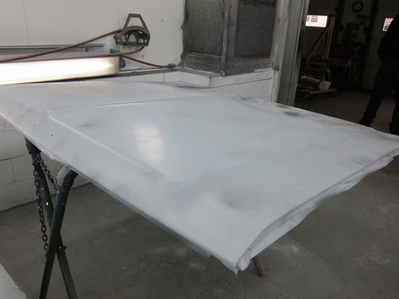 White hood on a stand in a workshop