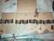1994 Land Rover Range Rover - Several engine bearings are arranged on a piece of cardboard, possibly for replacement or inspection.
