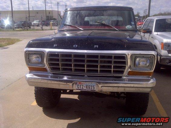 Front view of a black 1979 Ford Bronco with a chrome grille and bumper. License plate CT2-K615 is visible