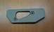 1991 Ford Festiva - This is a tan plastic interior trim piece with a cutout and two mounting holes.