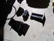 1992 Ford Bronco - Several engine mounts are laid out on a concrete floor.