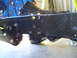 1992 Ford Bronco - This image shows the underside of a vehicle, focusing on the frame and suspension system.