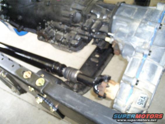 Transmission and driveshaft assembly with a tag reading 9RA
