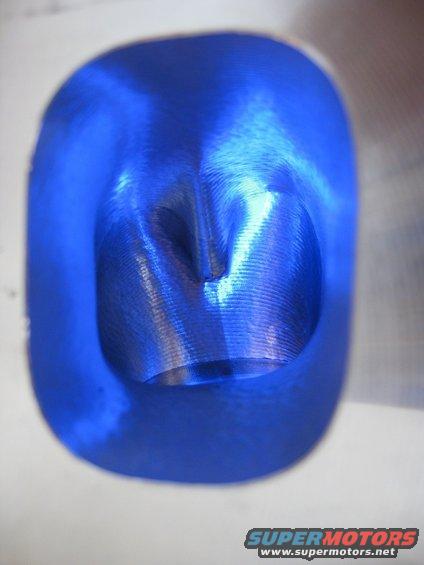 blue intake port with machined finish