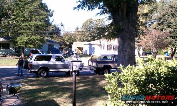 1979 Ford Bronco and another Bronco parked on street