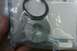 2005 GMC Yukon - A metal transmission part and a ring seal are shown inside plastic packaging.