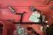 2005 GMC Yukon - A disassembled transmission wiring harness and solenoid are laid out on a red workbench.