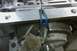 2005 GMC Yukon - Close-up of a transmission component being serviced with tools.
