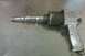 2005 GMC Yukon - This air impact wrench is a tool used for automotive repair, likely for transmission work.