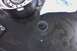 2005 GMC Yukon - Close-up view of a transmission component, possibly during a rebuild process.
