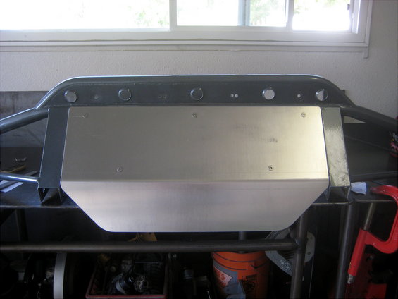 Custom front bumper with skid plate, bolted to a frame