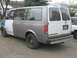 1992 GMC Safari - This 1992 GMC Safari van is seen from the rear, showing its varied paintwork and license plate.