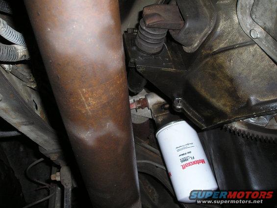Driveshaft and Motorcraft FL-1995 oil filter on a vehicle underside