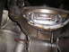 1997 Ford F-250 - Close-up view of a transmission bell housing and flywheel assembly.