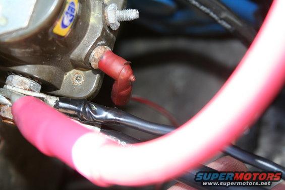 Starter motor wiring with red and black cables connected