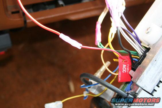 Close-up of car stereo wiring harness with ACC label