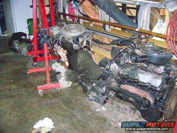 Engine and transmission assembly on an engine stand and on the floor
