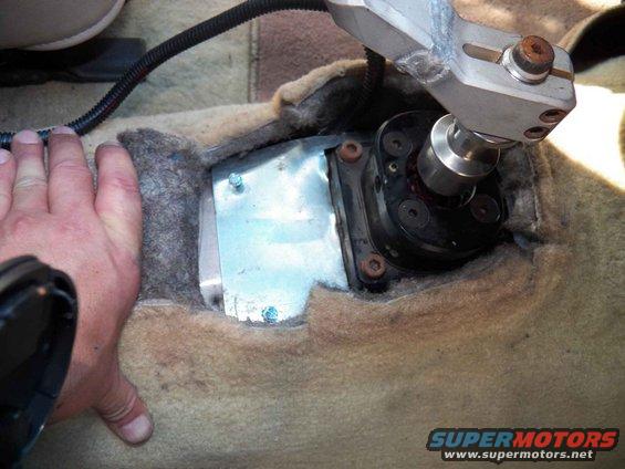 This is a plate that the former owner installed to keep the outside heat from getting in as much as possible.  It was off when I first bought and it makes a good difference with it in place.