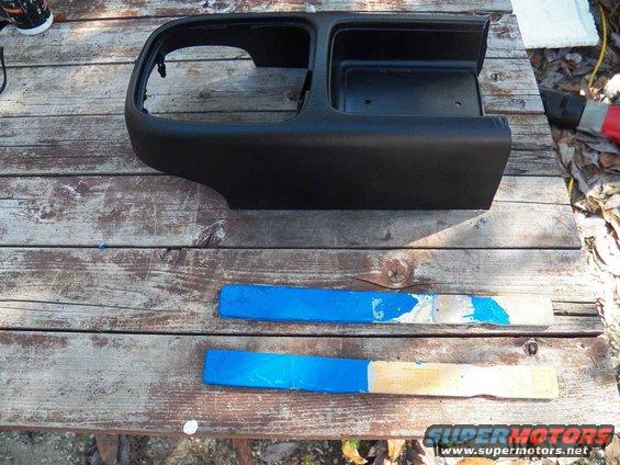 The old paint stirrers should shim it up just fine.