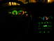 2003 Mercury Marauder - Interior view of a 2003 Mercury Marauder at night, with glowing green instrument cluster and center console lights.