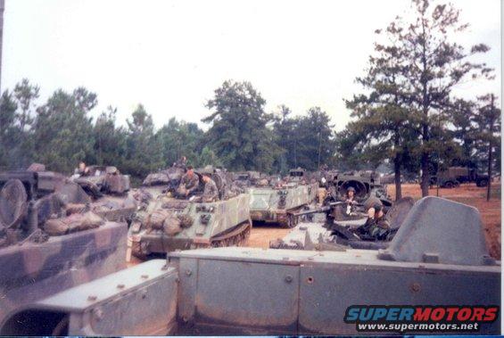 bfv02assembly.jpg Before the road march, all the vehicle assemble & wait...  IDK why we still had those old M901s with us.  Maybe for target practice...