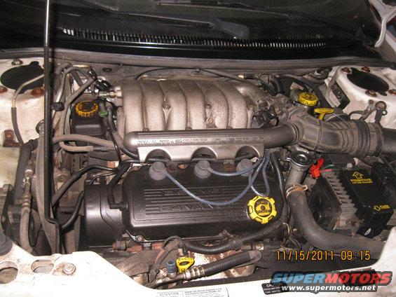 Engine bay with 3.4L V6 valve cover and intake manifold