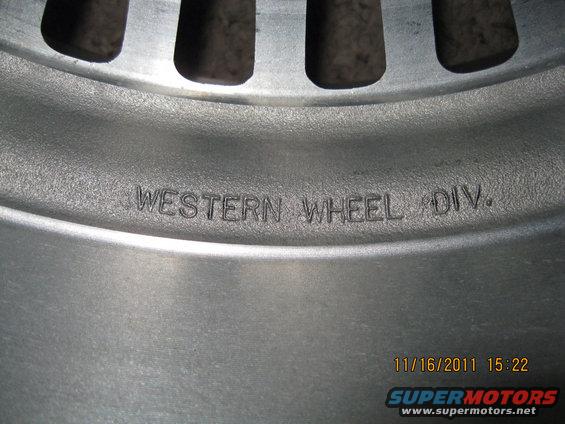 Aluminum wheel with "WESTERN WHEEL DIV." stamped on it