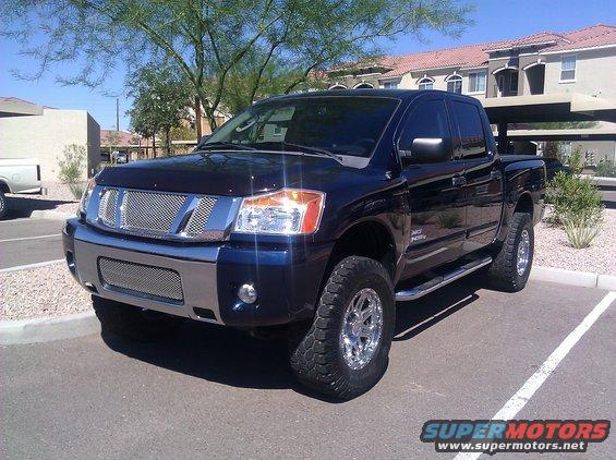 2008 Nissan Titan pickup truck parked in a lot, front 3/4 view