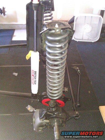 Front suspension assembly with coil spring and Doetsch Tech shock absorber