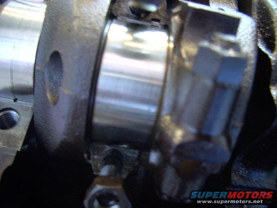 Main and rod journals are in amazing shape for a 27 year old engine. So were the bearings, but at Rock Auto's prices, we're replacing them and polishing the crank journals.