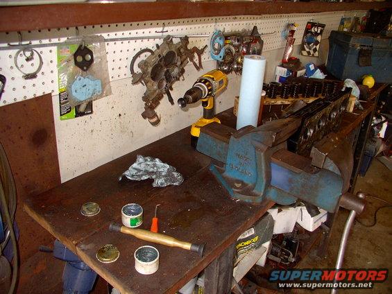 Valve lapping time again. There's the course and fine lapping pastes on the bench in front of the Record vice.