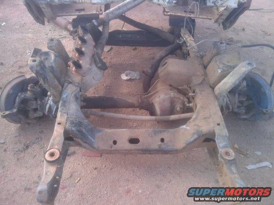 chassis frame with suspension components, differential, and brake parts